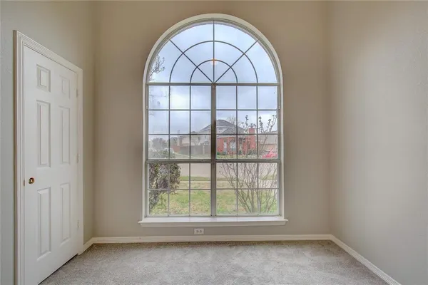 an empty room with a window