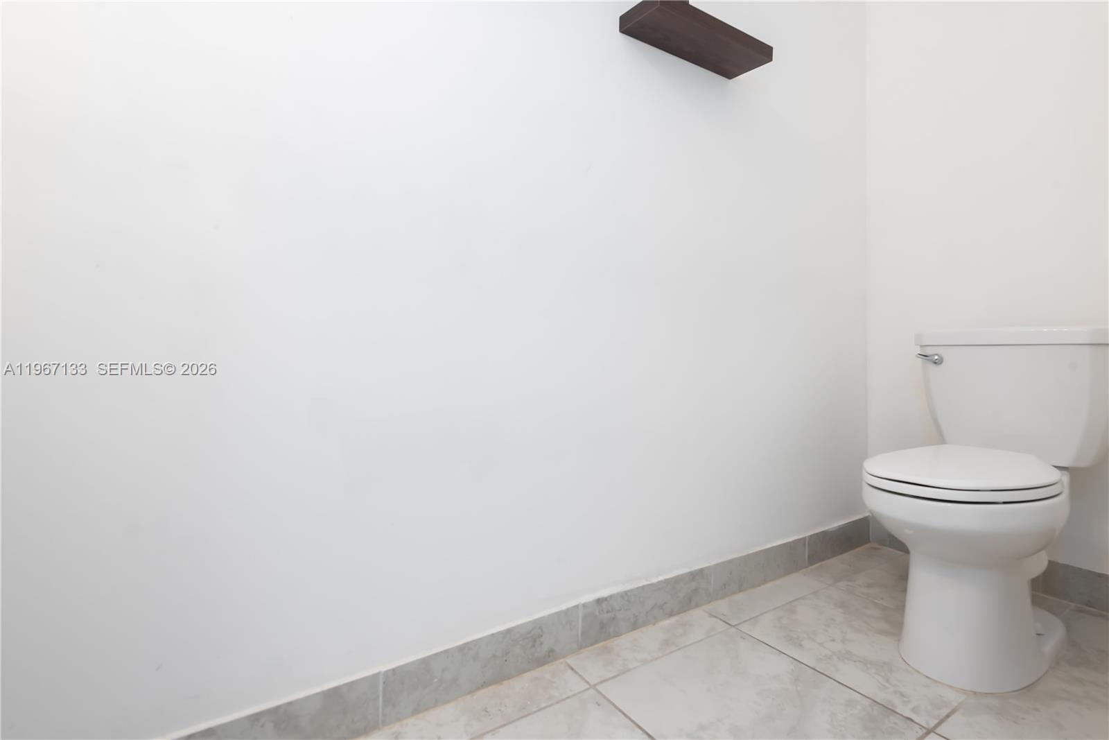 25128 Southwest 113th Place Homestead, FL 33032 - Photo 11 of 39 a bathroom with a toilet
