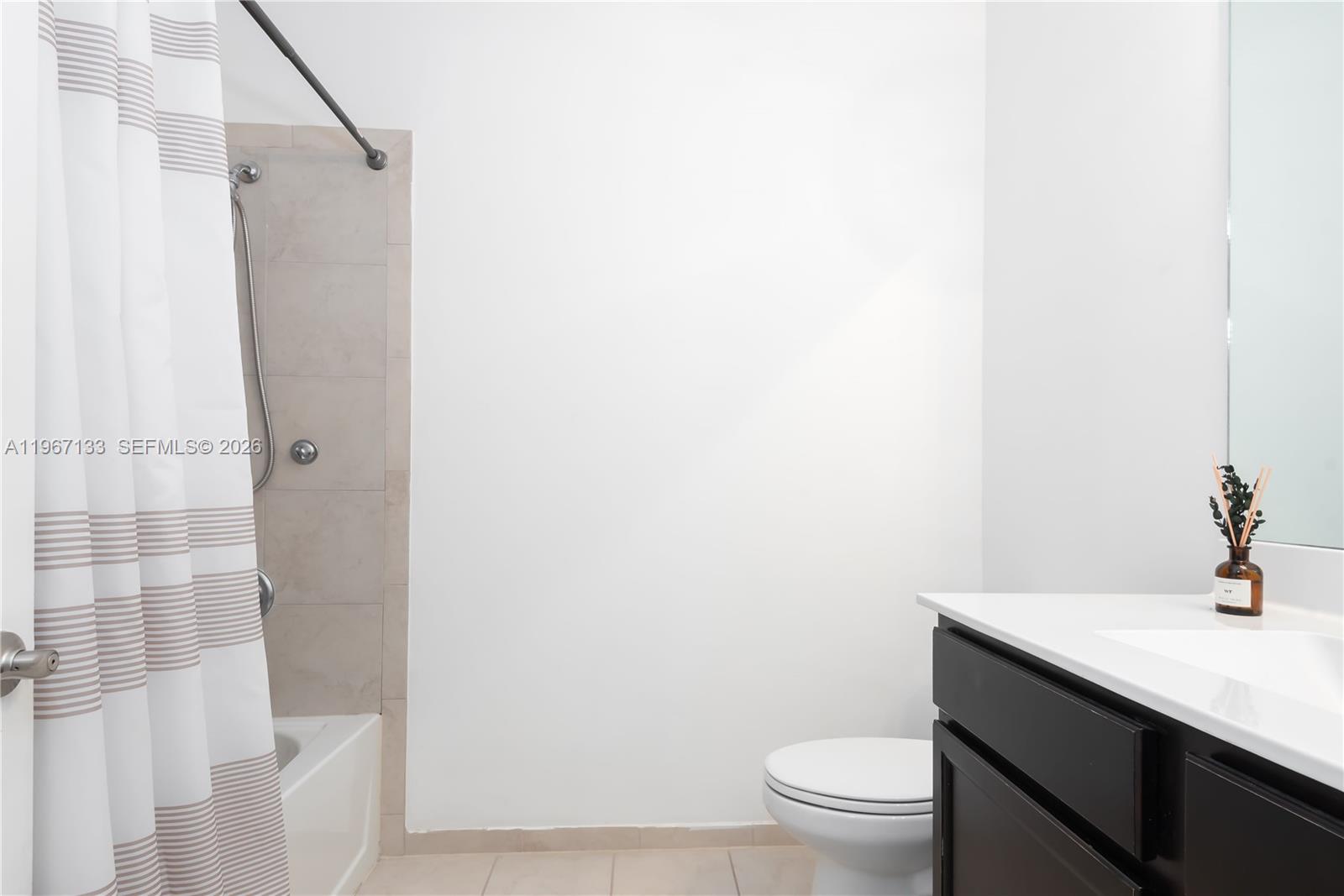25128 Southwest 113th Place Homestead, FL 33032 - Photo 29 of 39 a bathroom with a sink a toilet and shower