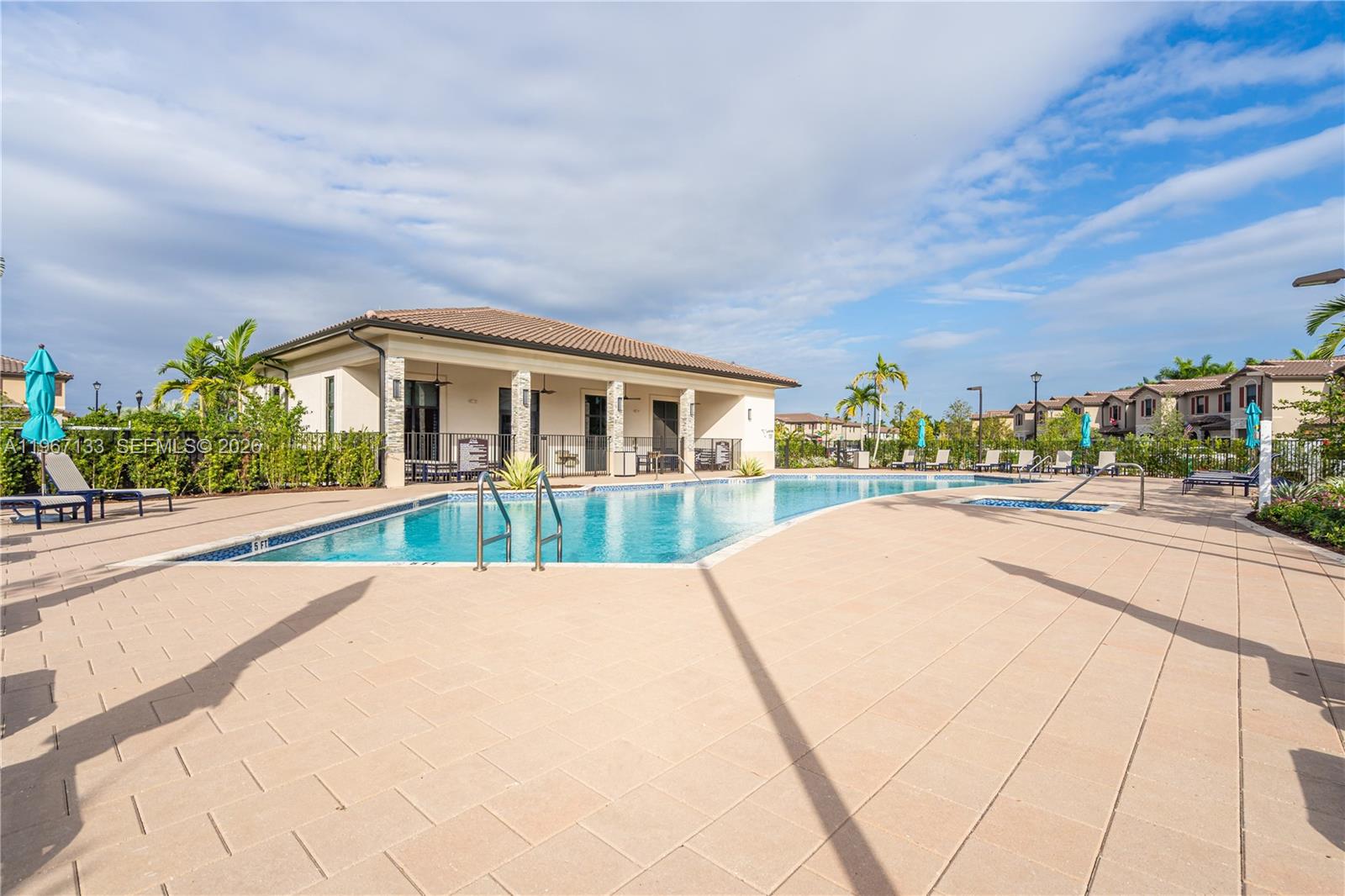 25128 Southwest 113th Place Homestead, FL 33032 - Photo 38 of 39 a view of a house with a swimming pool