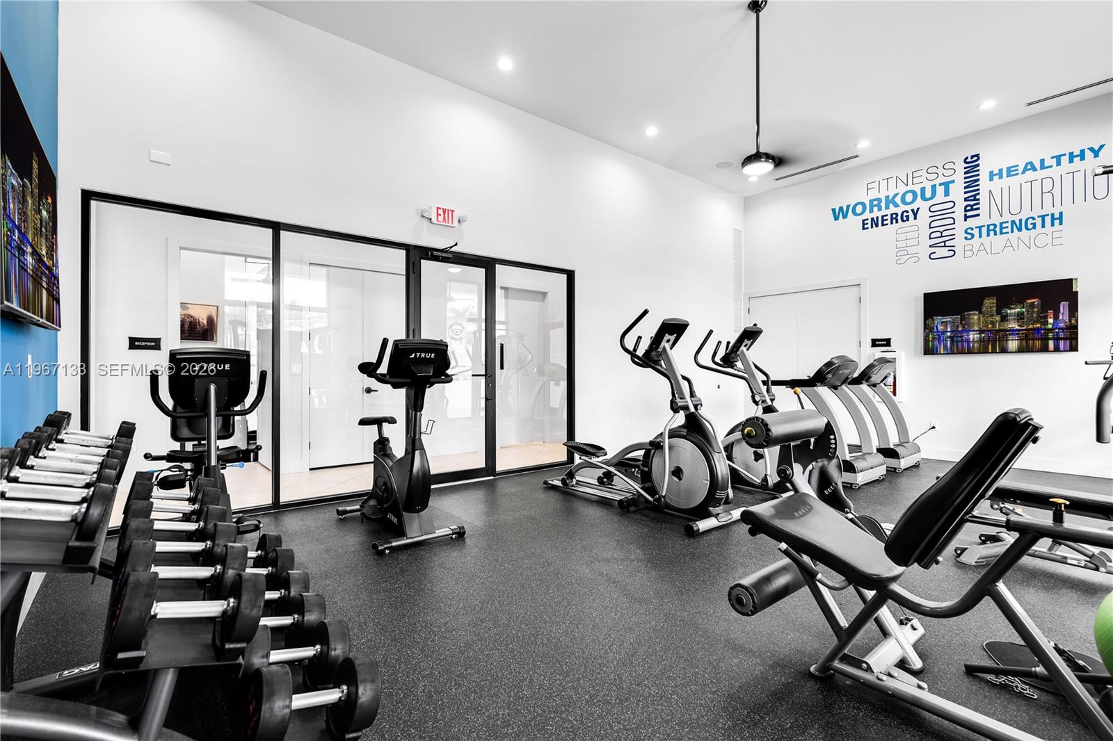 25128 Southwest 113th Place Homestead, FL 33032 - Photo 39 of 39 a view of a room with gym equipment