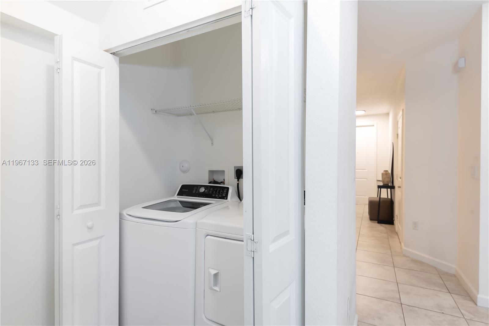 25128 Southwest 113th Place Homestead, FL 33032 - Photo 9 of 39 a room with storage and utility