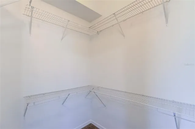 a view of a room with racks on the wall