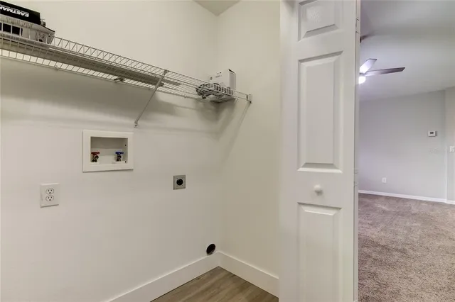 a view of a room with rack on the wall