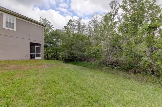 a view of a backyard with a garden