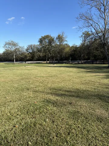 a view of outdoor space and yard