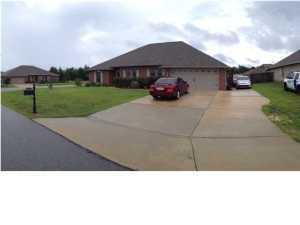 5237 Moore Loop Crestview, FL 32536 - Photo 1 of 17 a black and white photo of a house
