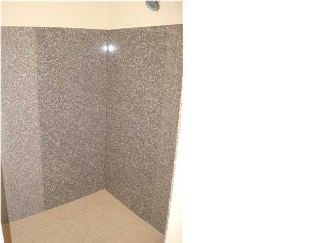 5237 Moore Loop Crestview, FL 32536 - Photo 12 of 17 a bathroom with a shower
