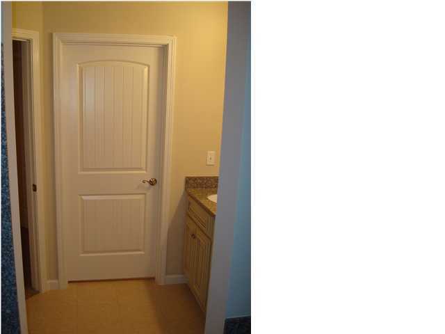 5237 Moore Loop Crestview, FL 32536 - Photo 14 of 17 a room with a door