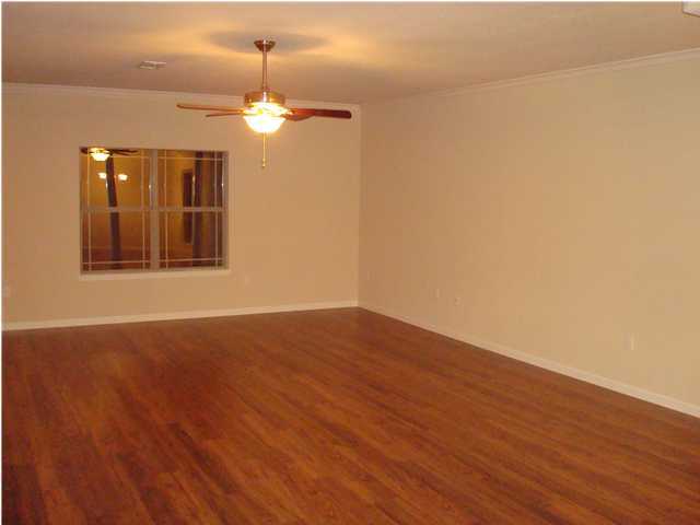 5237 Moore Loop Crestview, FL 32536 - Photo 6 of 17 wooden floor in an empty room