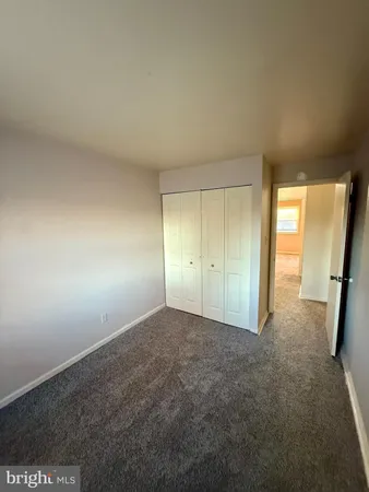 a view of hallway with closet
