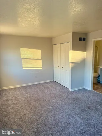 an empty room with closet