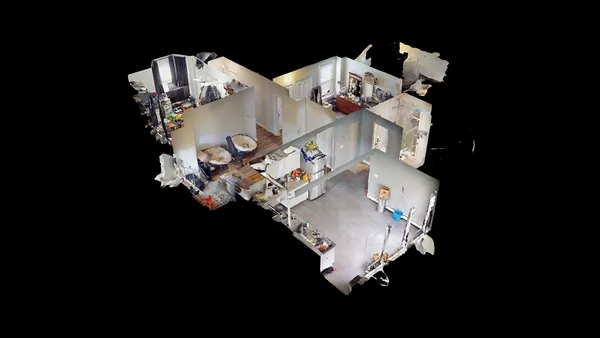 a view of table and a chandelier