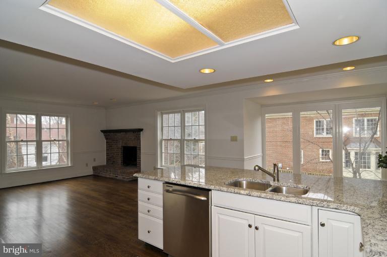 2600 North Glebe Road Arlington, VA 22207 - Photo 7 of 23 Kitchen towards Family Room with fireplace