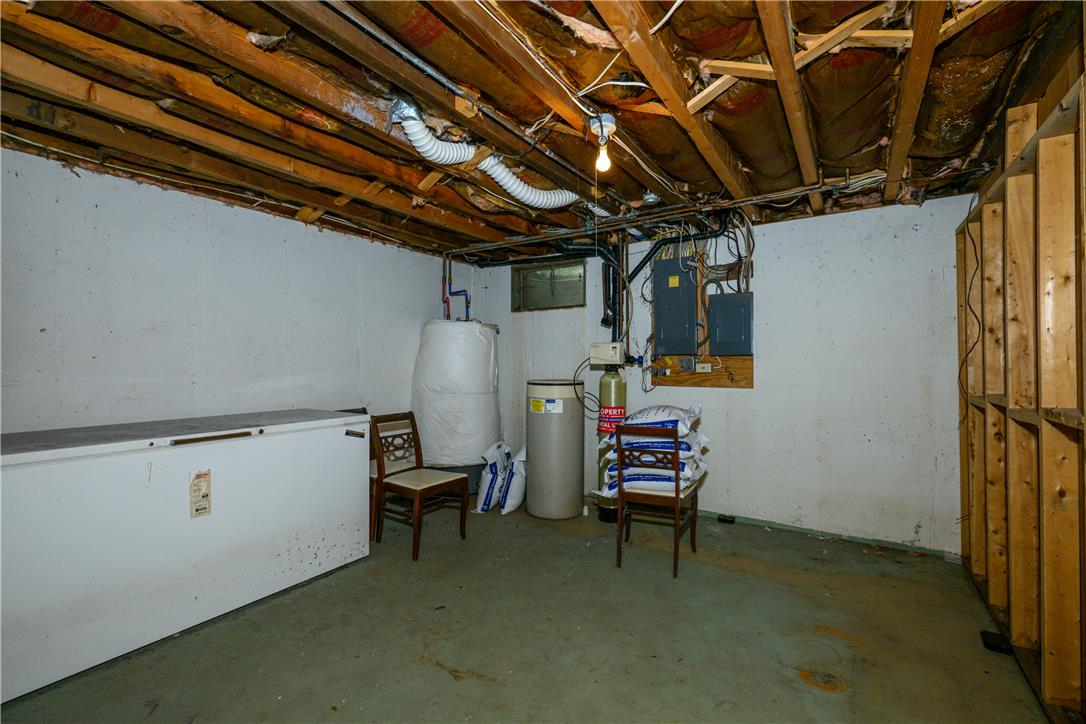 2516 Rachael Lane Orefield, PA 18069 - Photo 31 of 45 Functional basement space, ideal for storage or future development, offers utility access.