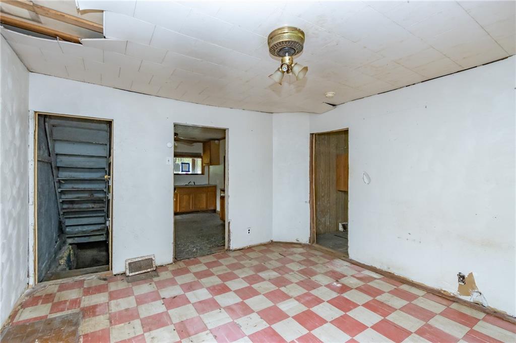 2065 1st Street Apollo, PA 15613 - Photo 5 of 16 a bedroom with a bed and a chandelier