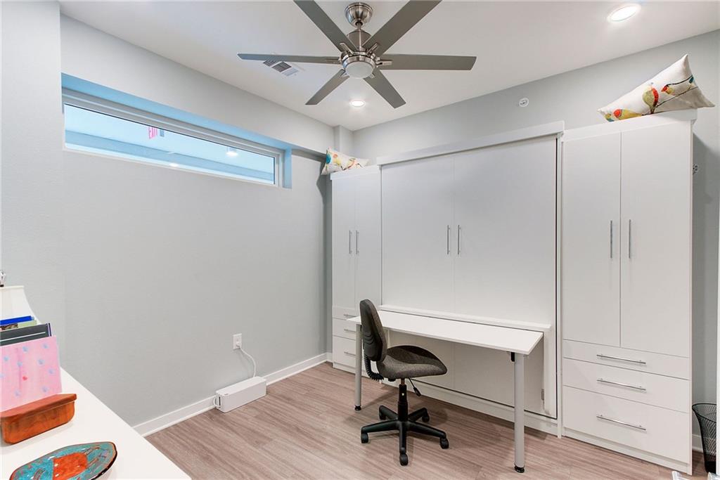 4361 South Congress Avenue, Unit 336 Austin, TX 78745 - Photo 18 of 30 a view of a workspace with furniture and a window