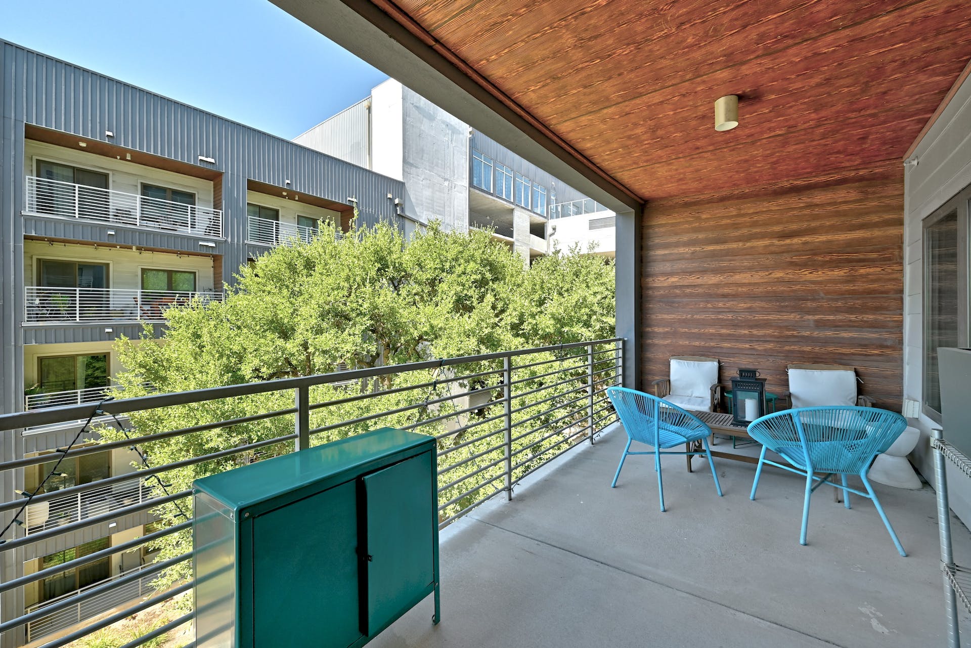 4361 South Congress Avenue, Unit 336 Austin, TX 78745 - Photo 21 of 30 a chairs and a table in a balcony