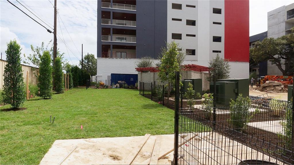 4361 South Congress Avenue, Unit 336 Austin, TX 78745 - Photo 22 of 30 a view of a building with garden