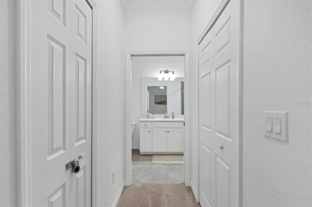 18114 Gawthrop Drive, Unit 405 Bradenton, FL 34211 - Photo 20 of 72 a bathroom with a granite countertop sink and a mirror