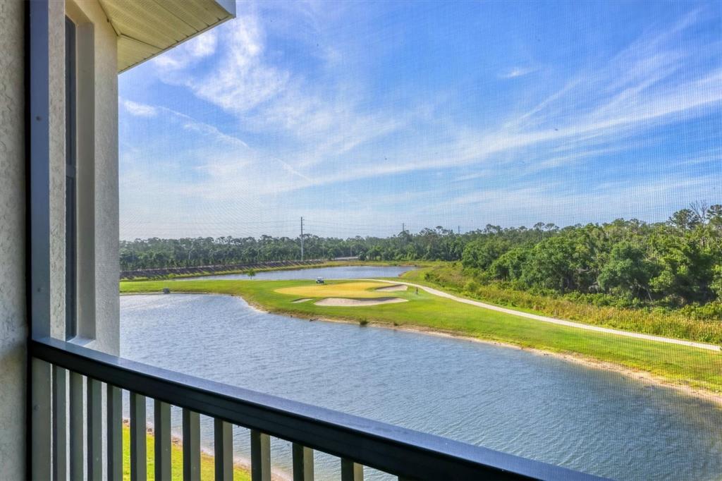 18114 Gawthrop Drive, Unit 405 Bradenton, FL 34211 - Photo 27 of 72 a view of a swimming pool and an outdoor seating