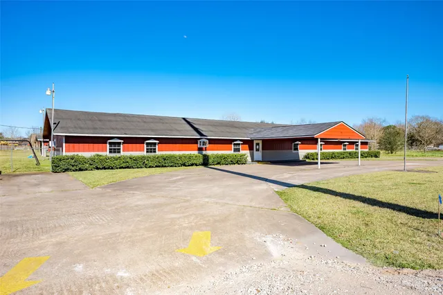 a view of swimming pool with table and chair
