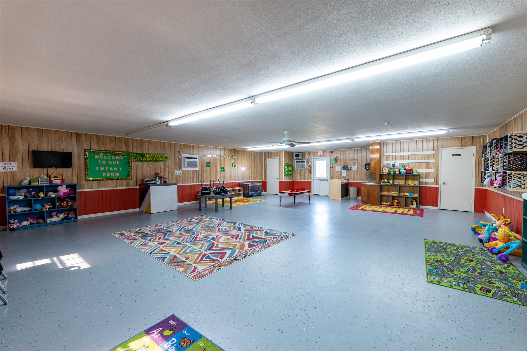 5111 Powerline Road Richmond, TX 77469 - Photo 14 of 22 a living room with furniture and a flat screen tv