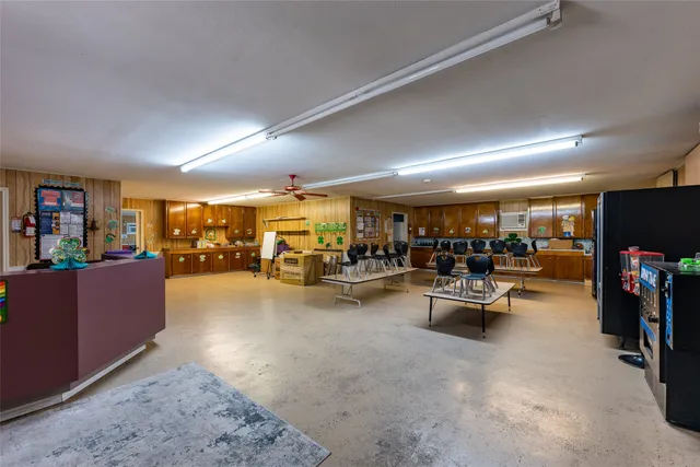a living room with lots of furniture and a flat screen tv