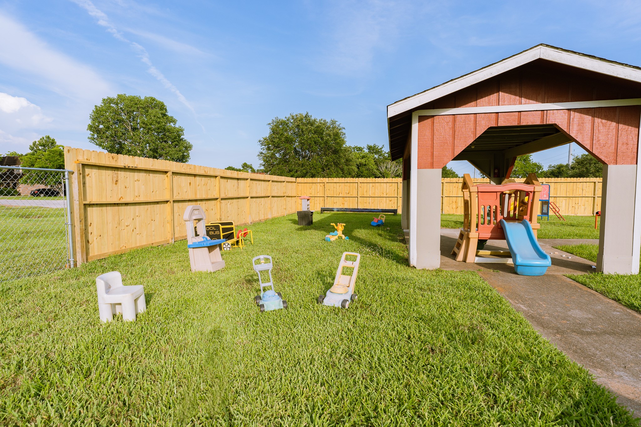 5111 Powerline Road Richmond, TX 77469 - Photo 21 of 22 a view of an house with backyard outdoor seating and hardwood