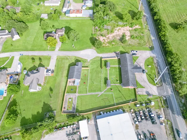 an aerial view of a tennis ground