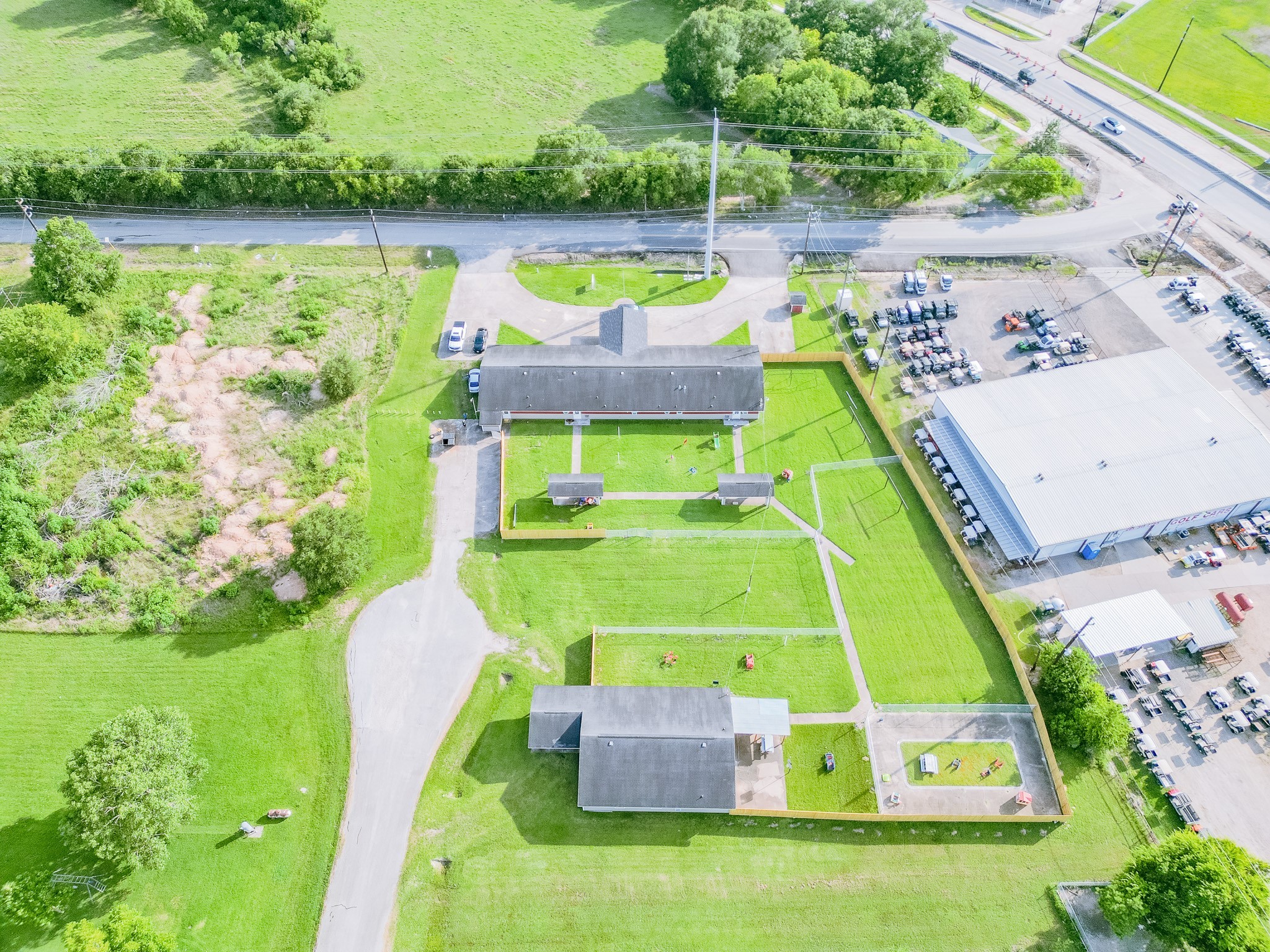 5111 Powerline Road Richmond, TX 77469 - Photo 5 of 22 a room with lots of trees and flowers