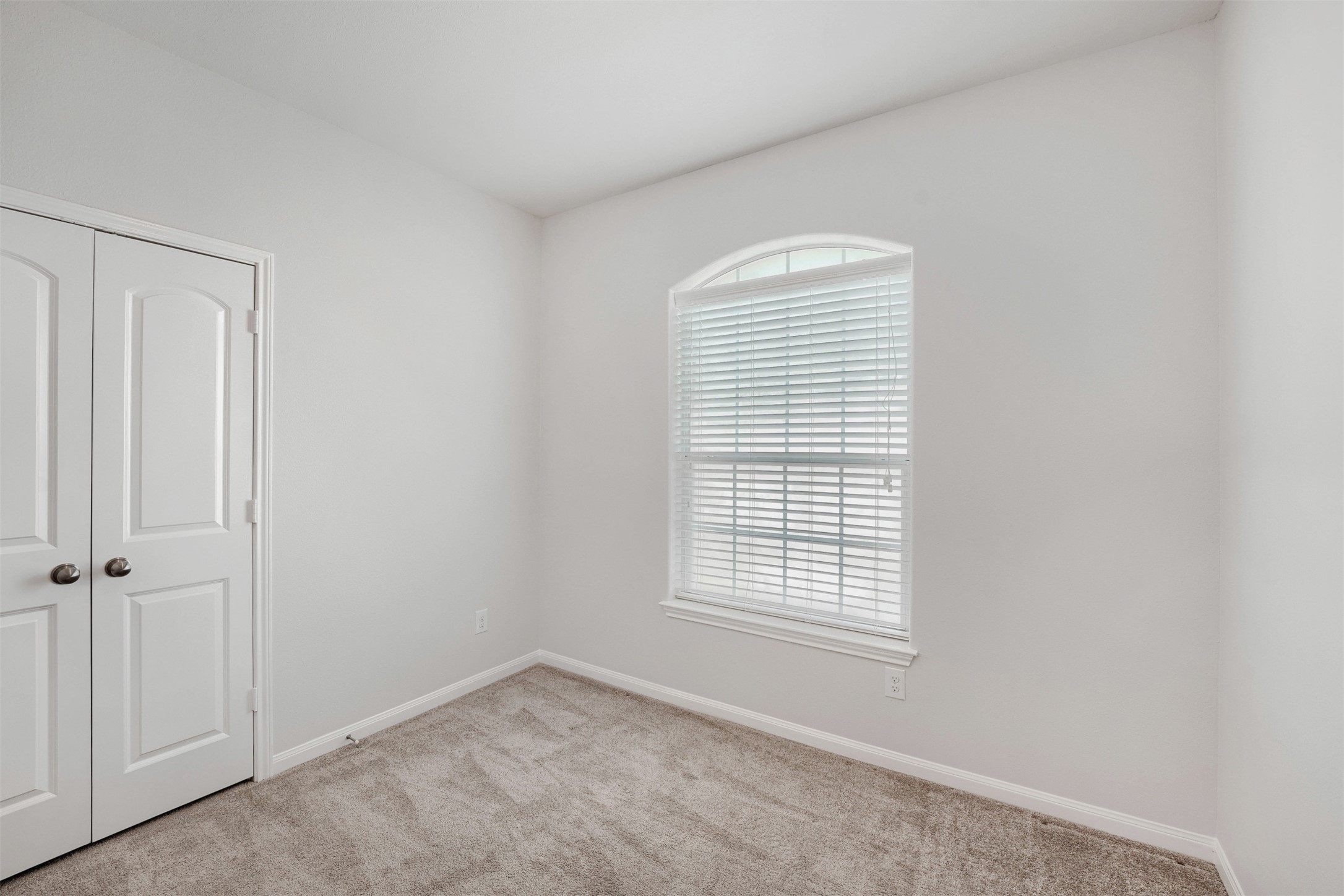 13408 Clara Martin Road Manor, TX 78653 - Photo 19 of 27 a view of an empty room with a window