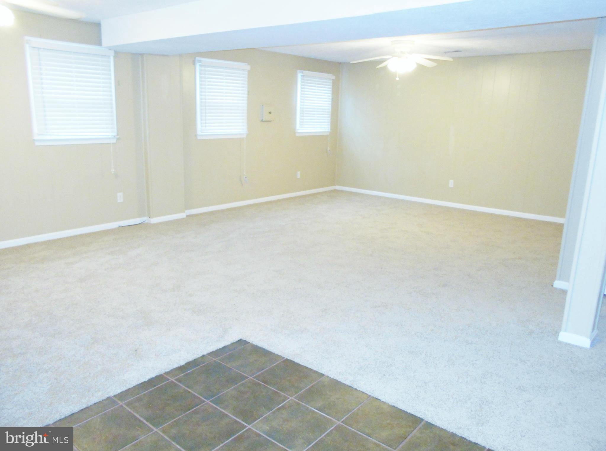 508 Clarks Run Road La Plata, MD 20646 - Photo 18 of 30 Lower Level Living Room w/ Brick Fireplace