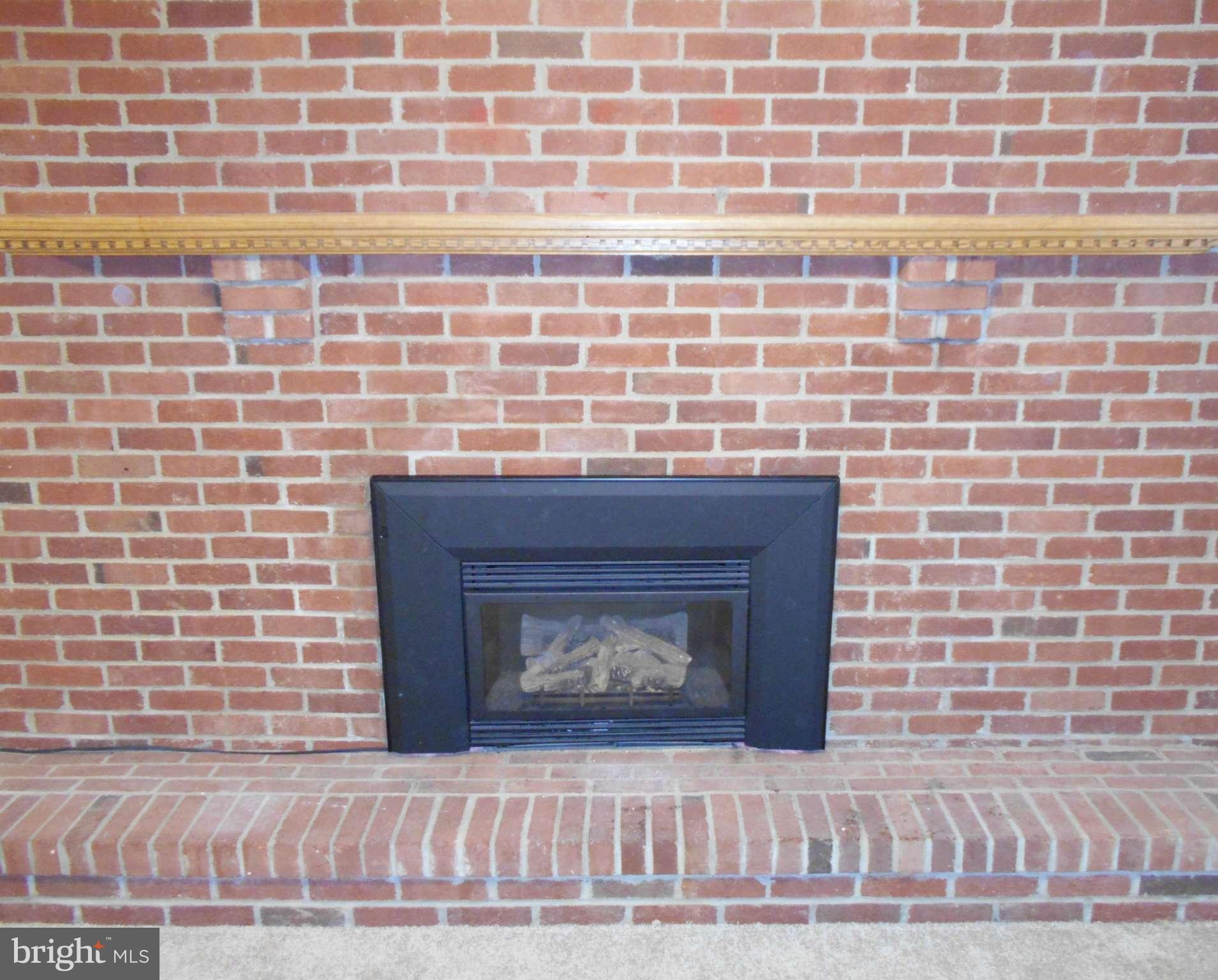 508 Clarks Run Road La Plata, MD 20646 - Photo 19 of 30 All Brick Fireplace to Cozy up to on Cold Nights