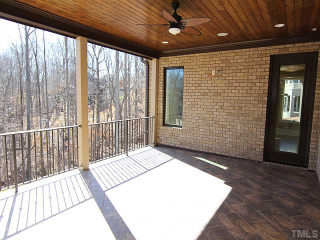 11220 Conley Cove Court Raleigh, NC 27613 - Photo 23 of 25 Enjoy our Carolina blue sky with your morning cup of coffee from this incredible view from the enclosed porch.<BR/>