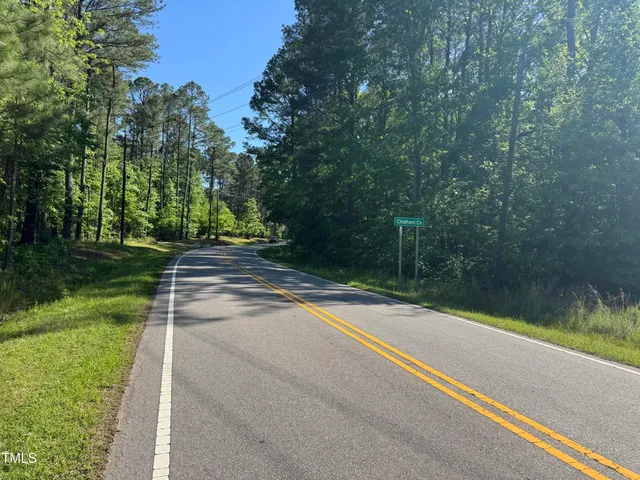 a view of a lake with a yard
