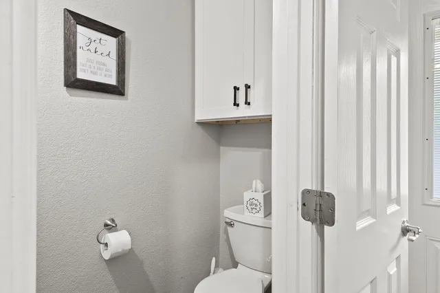 a bathroom with a toilet