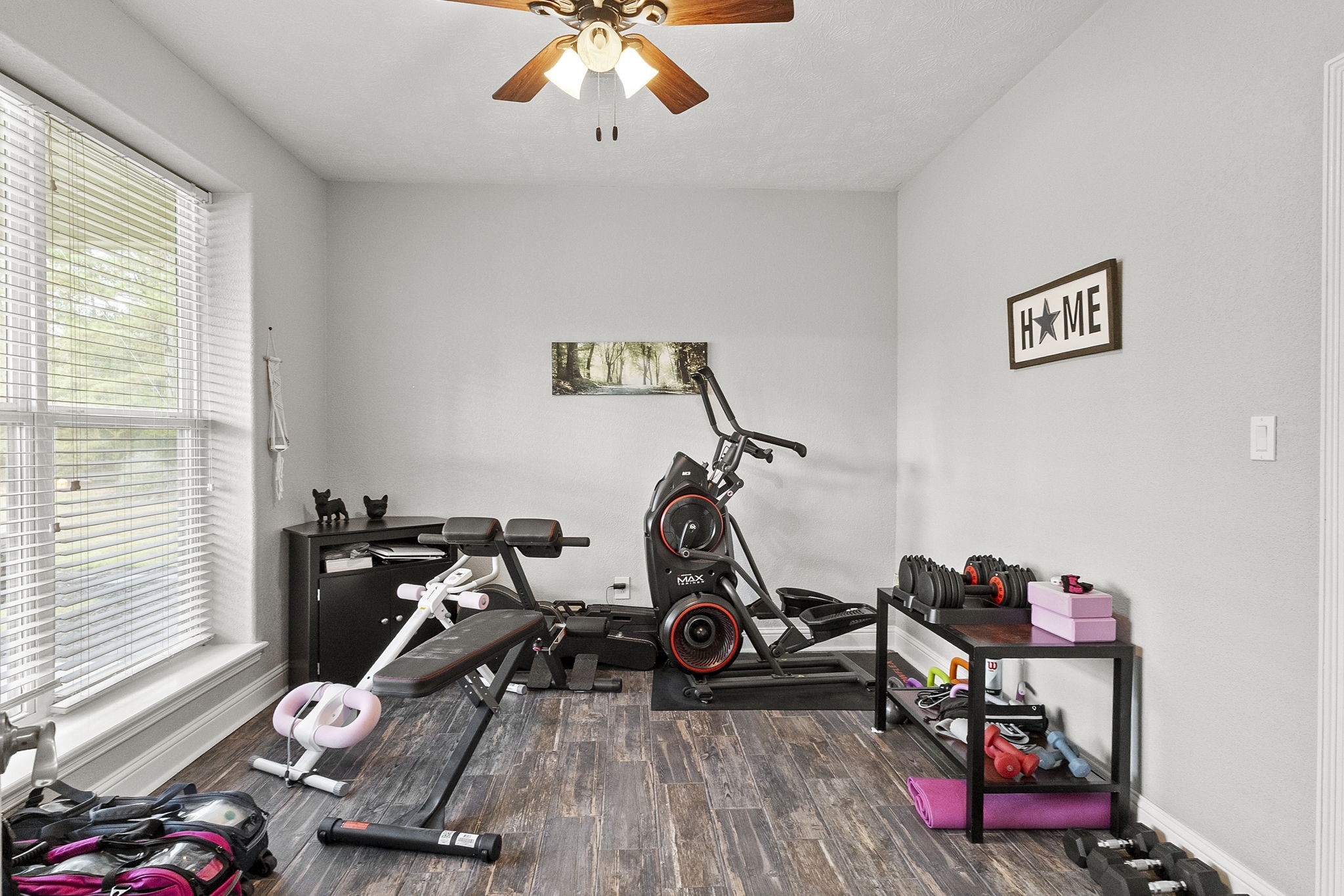 6938 Old Honey Island Road Kountze, TX 77625 - Photo 17 of 34 a view of a room with gym equipment