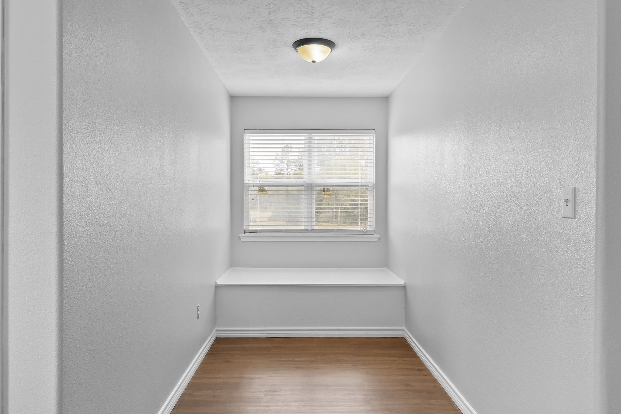 6938 Old Honey Island Road Kountze, TX 77625 - Photo 21 of 34 a view of an empty room with a window