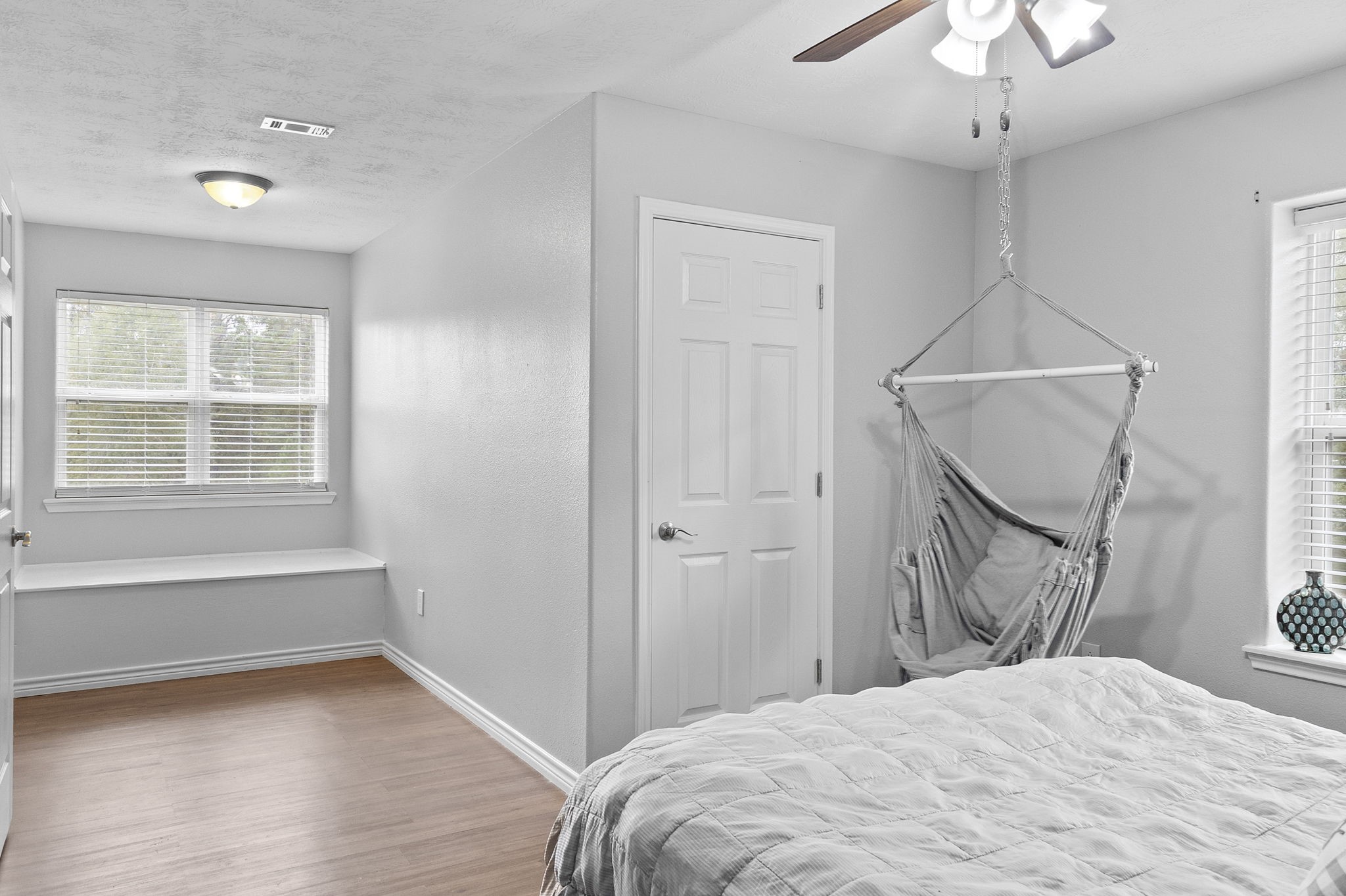6938 Old Honey Island Road Kountze, TX 77625 - Photo 23 of 34 a bedroom with a bed and a window