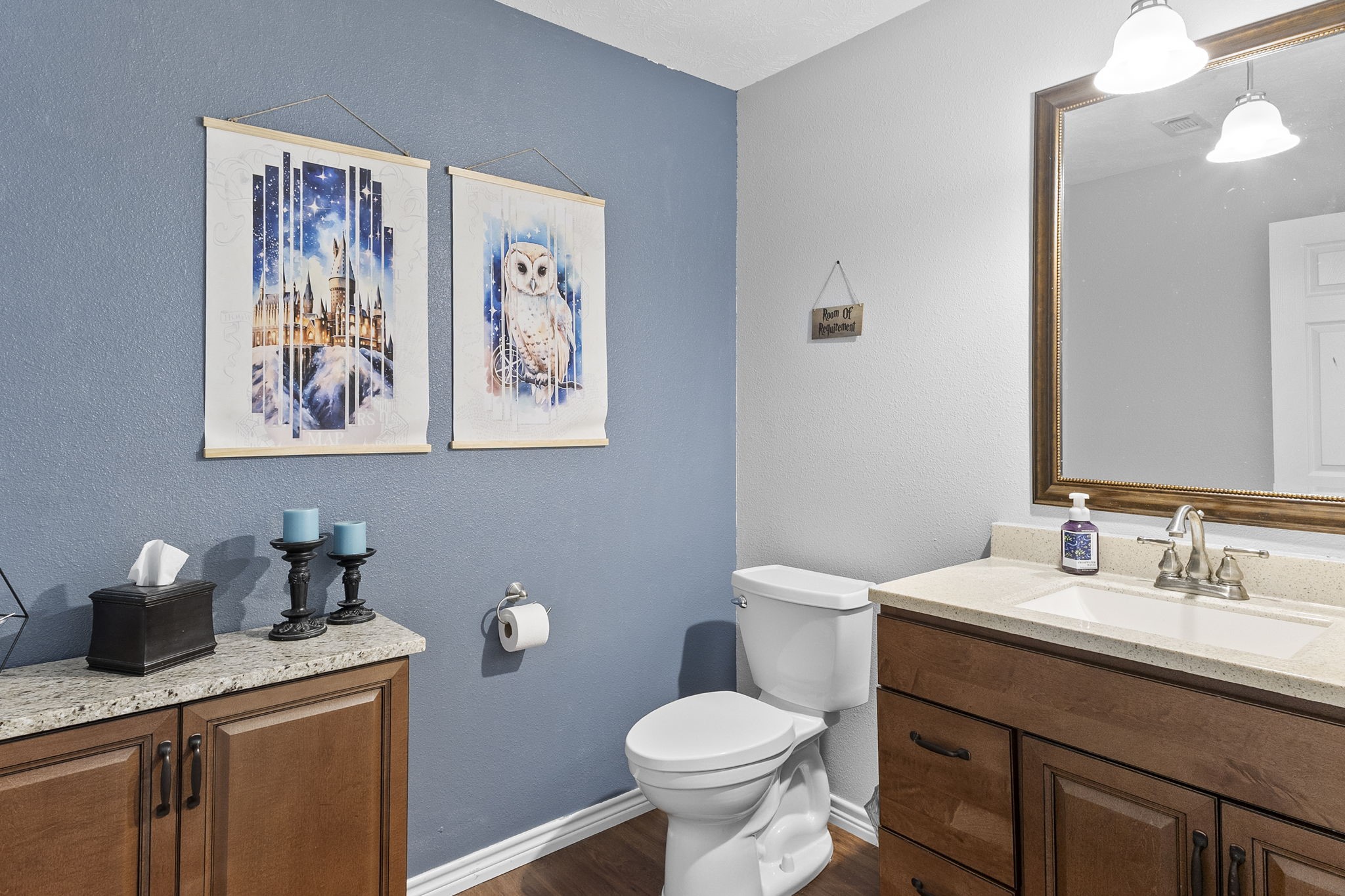 6938 Old Honey Island Road Kountze, TX 77625 - Photo 25 of 34 a bathroom with a toilet a sink and mirror
