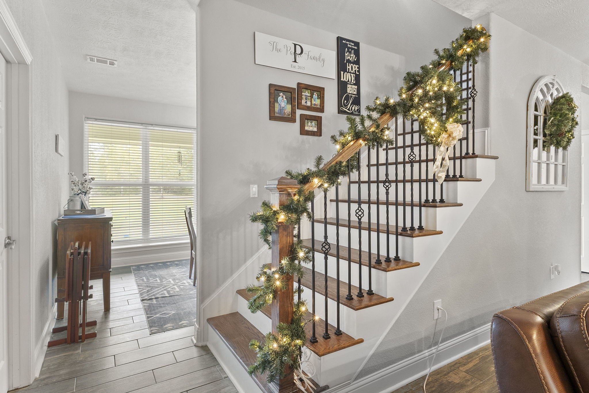 6938 Old Honey Island Road Kountze, TX 77625 - Photo 4 of 34 a view of staircase with wooden floor and windows
