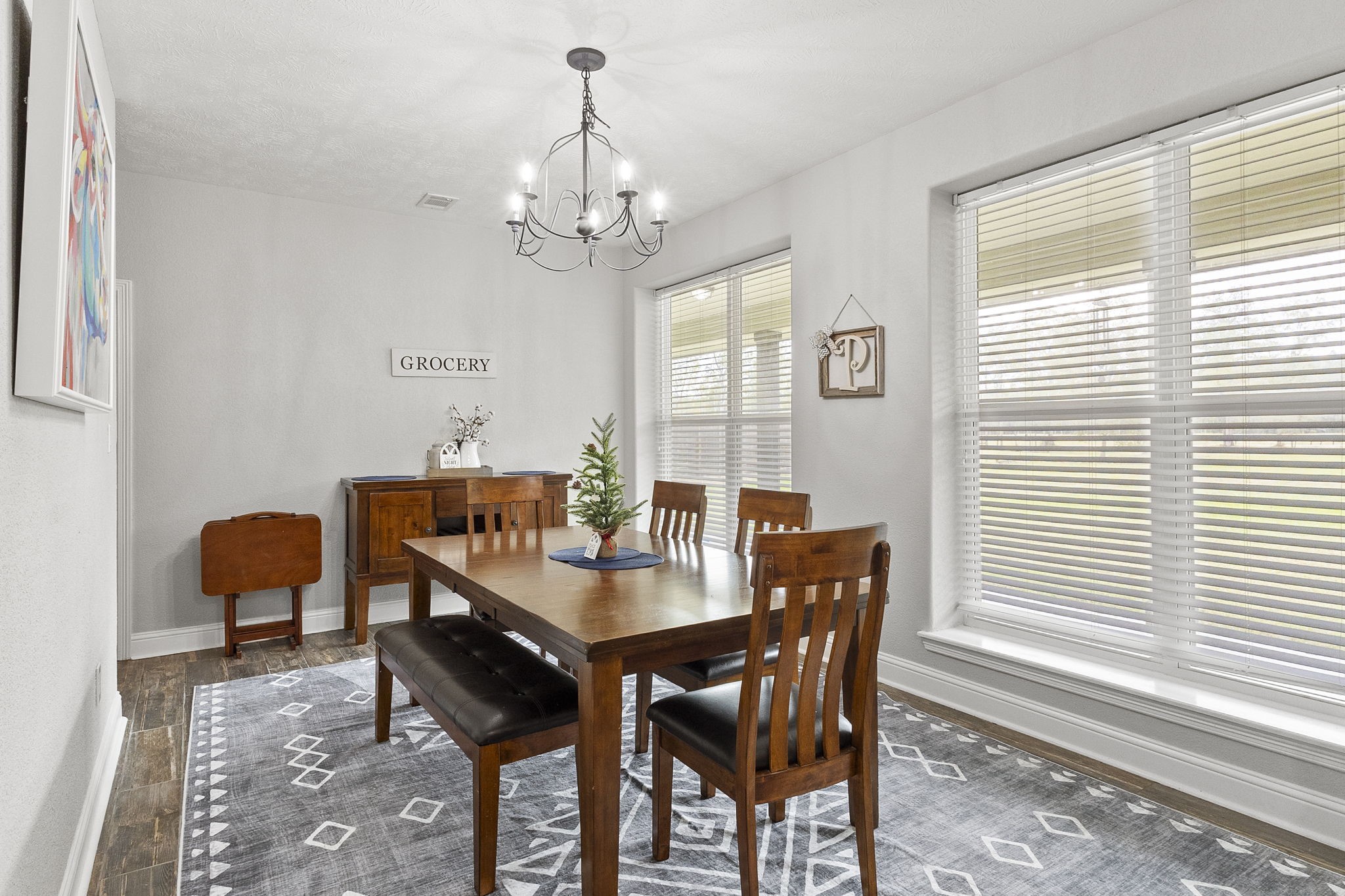 6938 Old Honey Island Road Kountze, TX 77625 - Photo 8 of 34 a view of a dining room with furniture window and outside view
