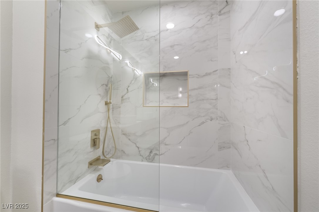 9205 Desert Village Avenue Las Vegas, NV 89147 - Photo 31 of 44 Bathroom with a combined bath / shower with marble appearance