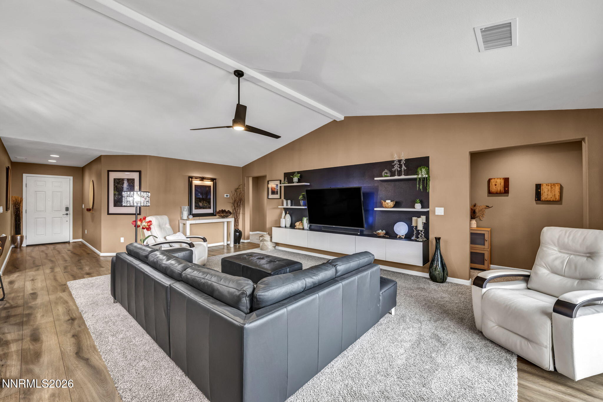 148 Snake Road Dayton, NV 89403 - Photo 12 of 57 a living room with furniture and a flat screen tv