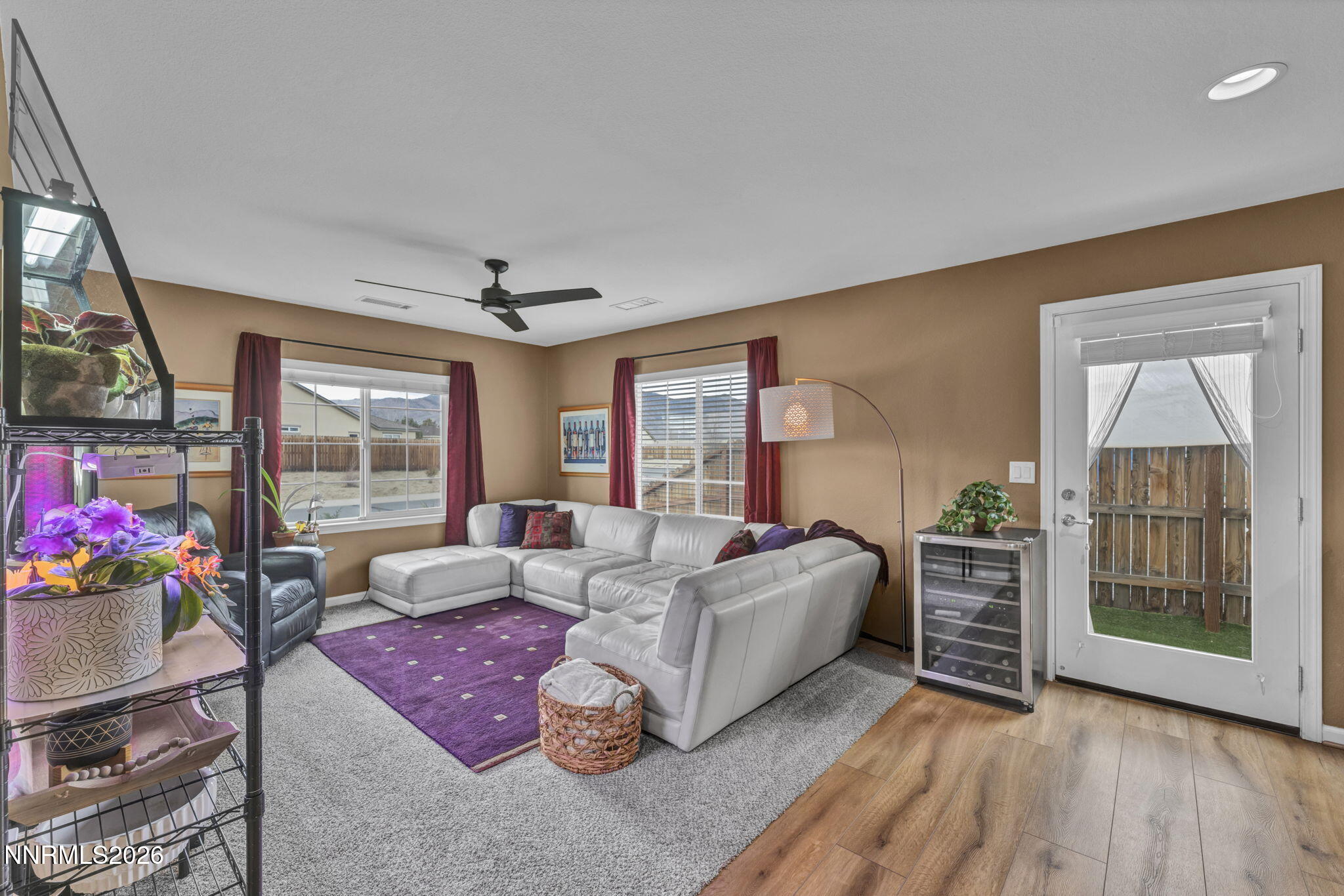 148 Snake Road Dayton, NV 89403 - Photo 27 of 57 a living room with furniture and a floor to ceiling window