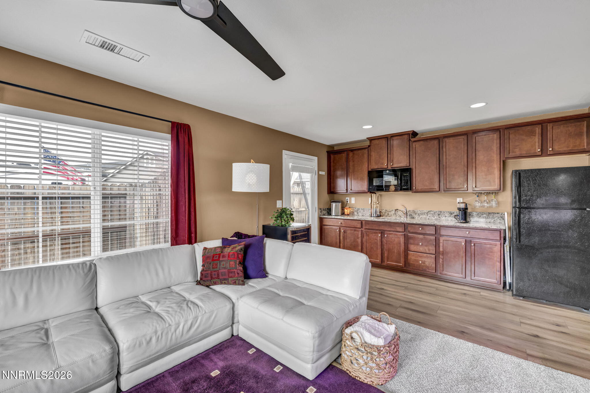 148 Snake Road Dayton, NV 89403 - Photo 30 of 57 a living room with furniture and a large window