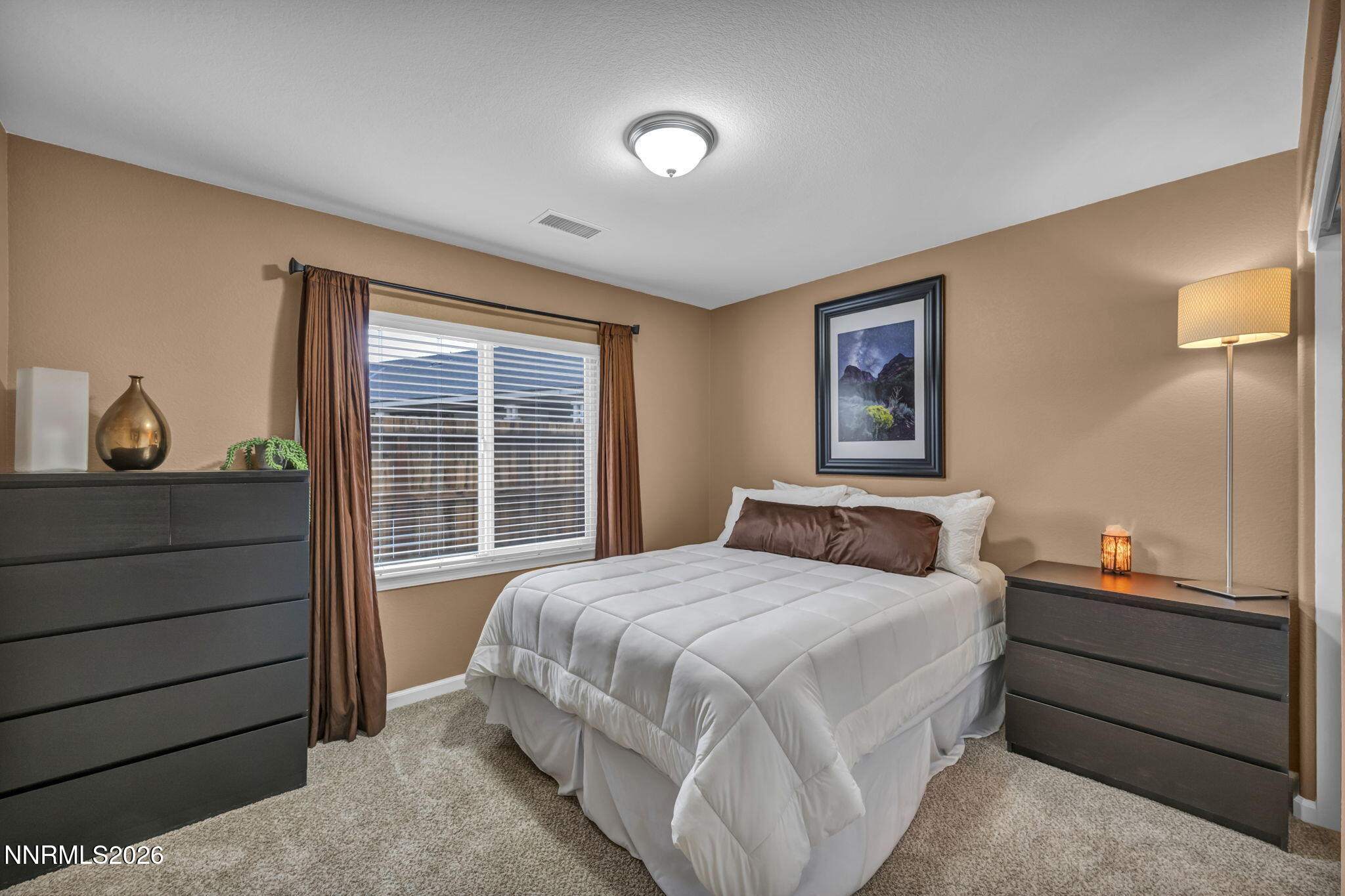 148 Snake Road Dayton, NV 89403 - Photo 38 of 57 a bedroom with a bed and a window