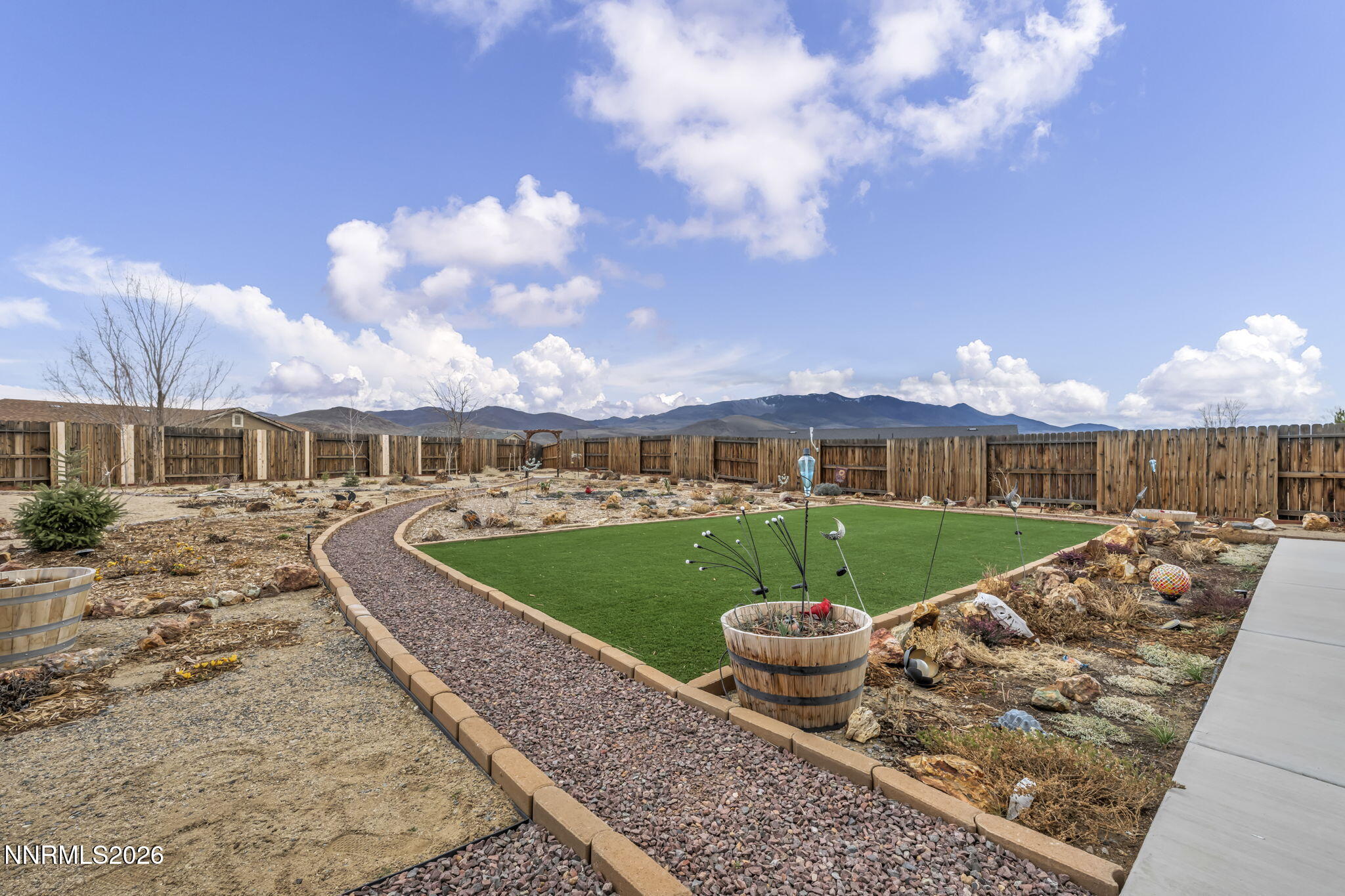 148 Snake Road Dayton, NV 89403 - Photo 45 of 57 a view of a house with a yard