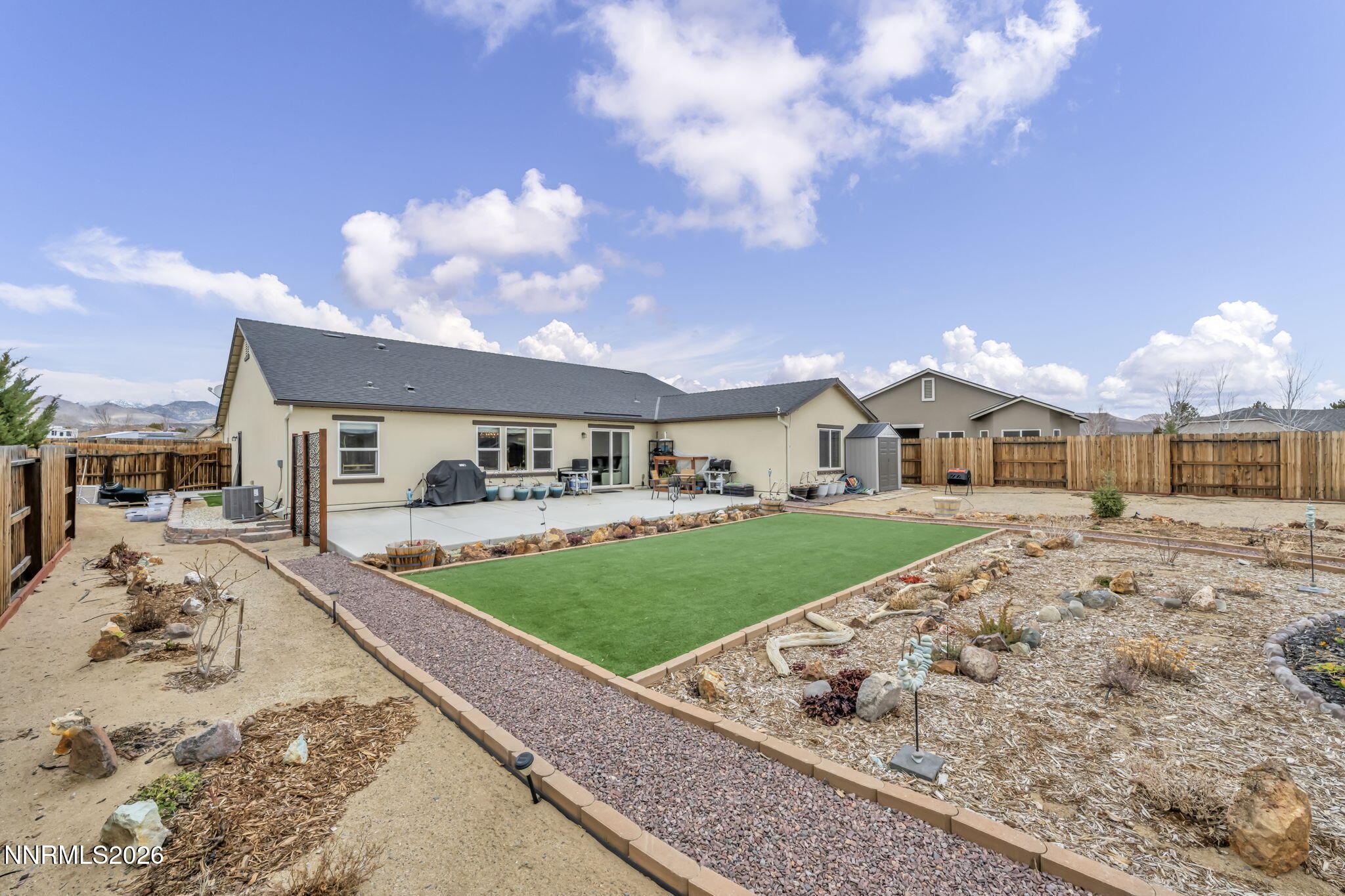 148 Snake Road Dayton, NV 89403 - Photo 50 of 57 a front view of a house with garden